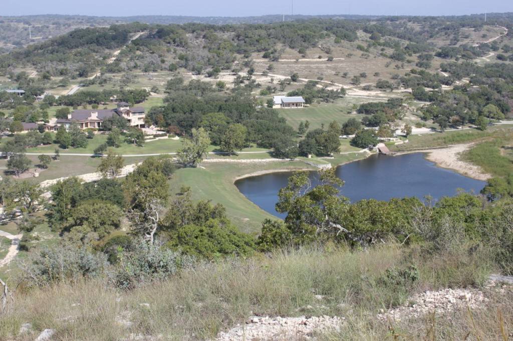 View of lake, Lakehouse and Main House from south hill