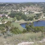 View of lake, Lakehouse and Main House from south hill