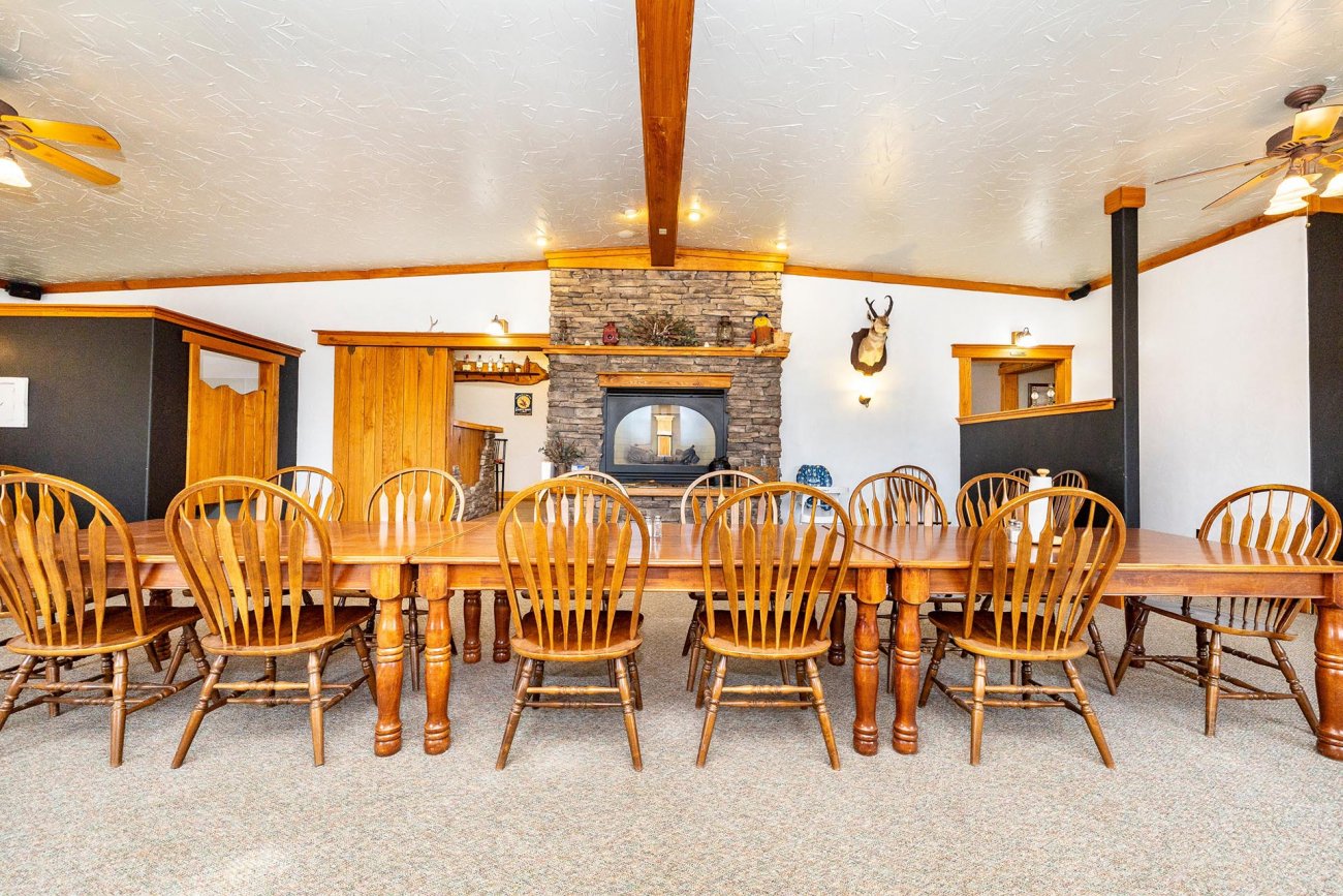 lodge-great-room-with-stone-fireplace-colorado-bow-barrel-lodge