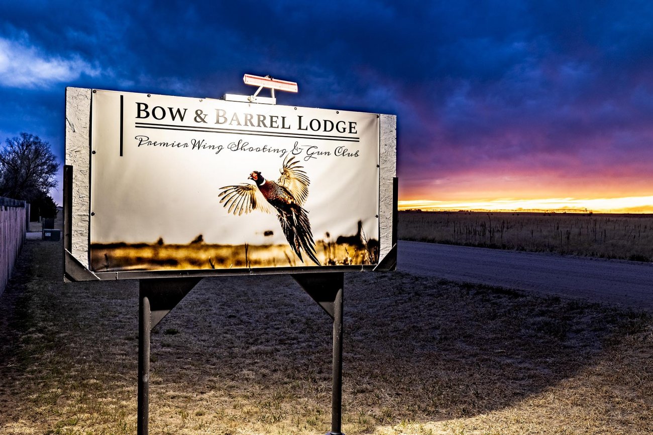 pheasant-hunting-lodge-sign-with-sunset-colorado-bow-barrel-lodge