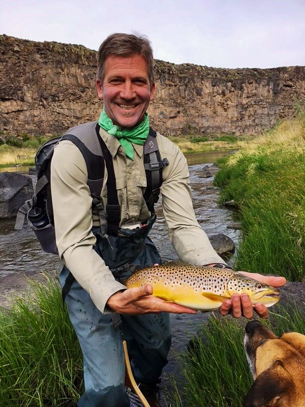 fly-fisherman-great-catch-brown-trout-rio-grande-river-colorado-Rio-Grande-del-Norte-National-Monument-Colorado-Rio-Grande-Del-Norte-Ranch