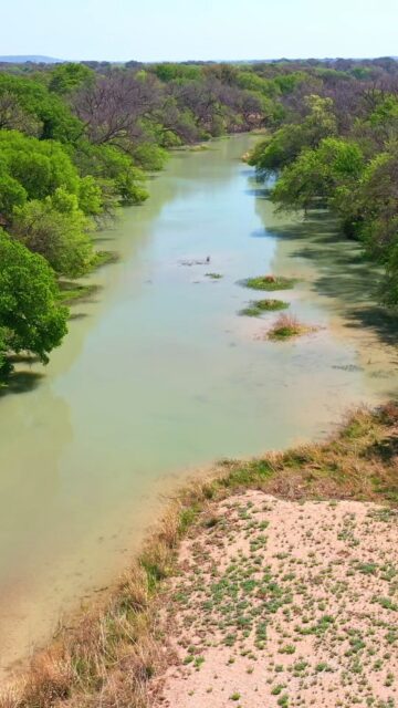 SAN SABA RIVER RETREAT

Tucked along the edge of the Texas Hill Country, this 61± acre retreat offers approximately 1,000 feet of San Saba River frontage and a true live-water escape. With sandy banks, deep pools, and flowing water, the river creates the perfect setting for fishing, swimming, and relaxing outdoors.

Two well-appointed cabins sit among mature oaks and pecans, while a hay meadow, two water wells, pond, and barn add to the property's versatility. Whether enjoyed as a family getaway, recreational retreat, or investment opportunity, San Saba River Retreat is a rare piece of Hill Country living.

Listing Details | republicranches.com/properties/texas/hill-country/san-saba-river-retreat/